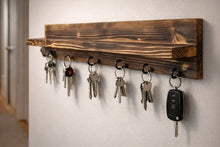 Load image into Gallery viewer, Rustic Shou Sugi Ban Key Holder with Shelf – Handmade Burnt Wood Entryway Organizer – Wall Mounted Key Rack with Hooks – Hallway Shelf
